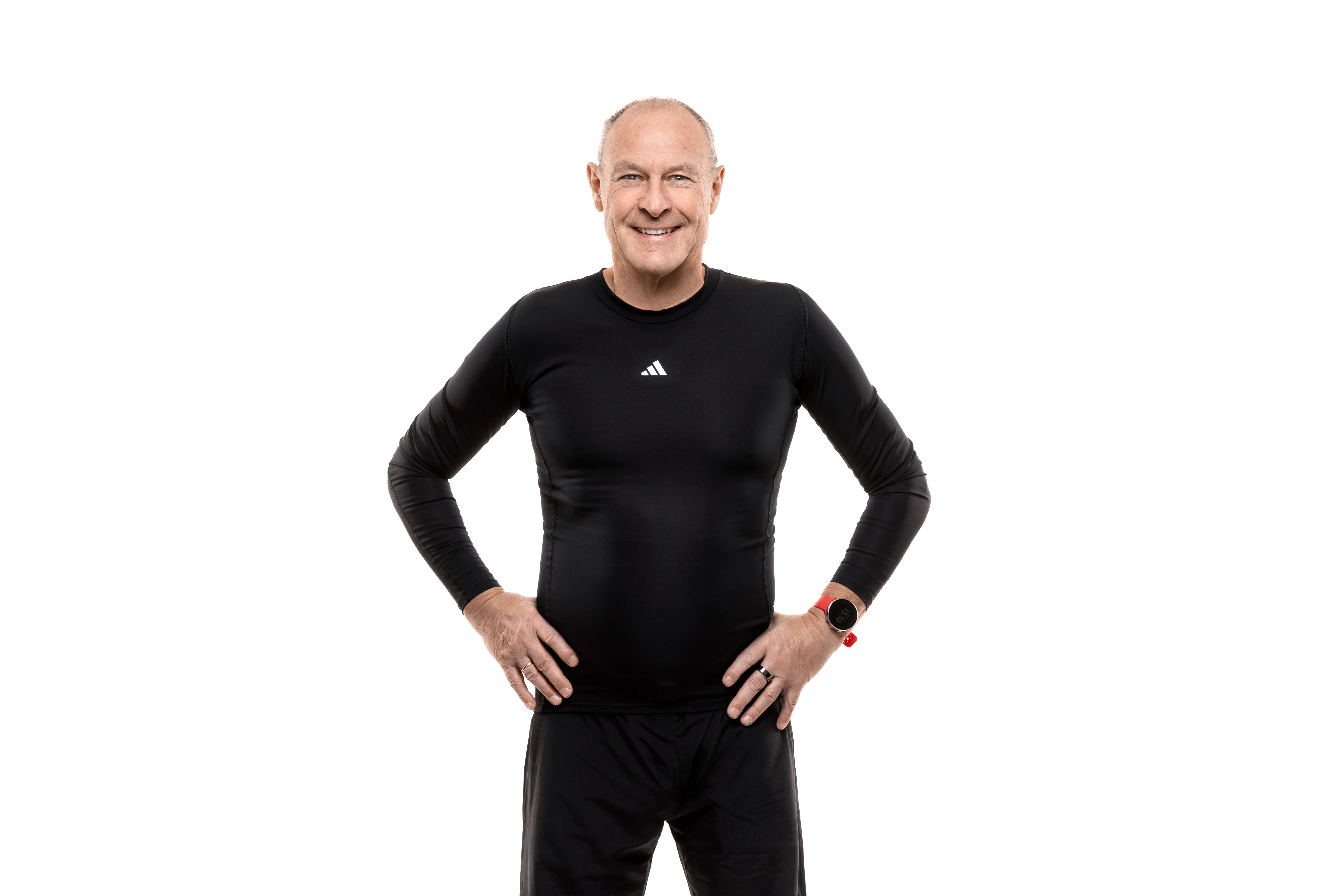 Norbert Kox in Sportkleidung, Hände in den Hüften
