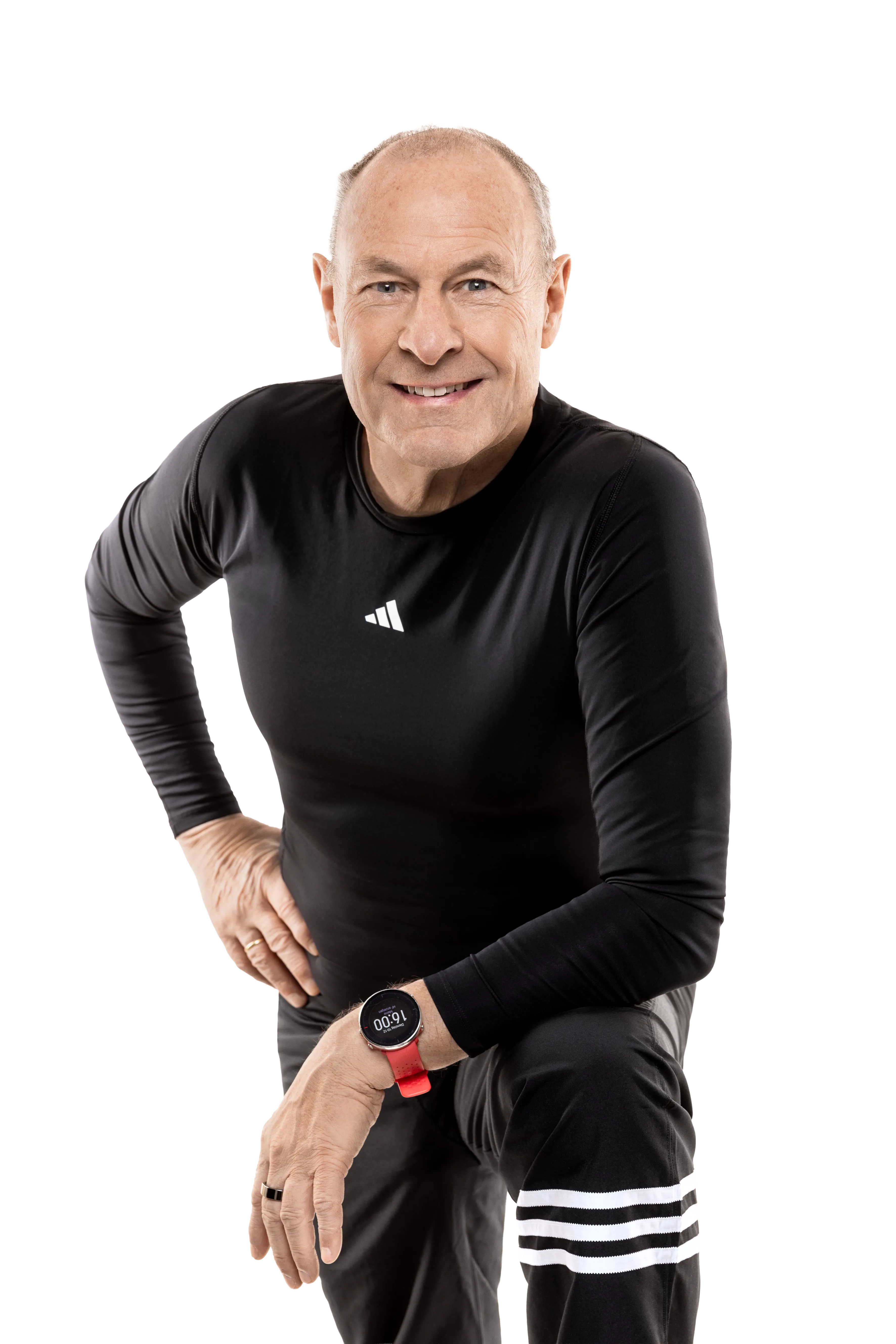 Norbert Kox lächelnd in schwarzem Sportshirt